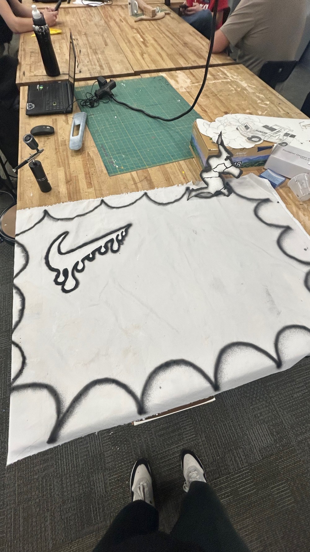 ‘Nike Swoosh’ , ‘Kappa’ , ‘Creative Brain Power’ , ‘Louis Vuitton’ , ‘Straight teeth clenching lip’ Credited designs caught in spider web’