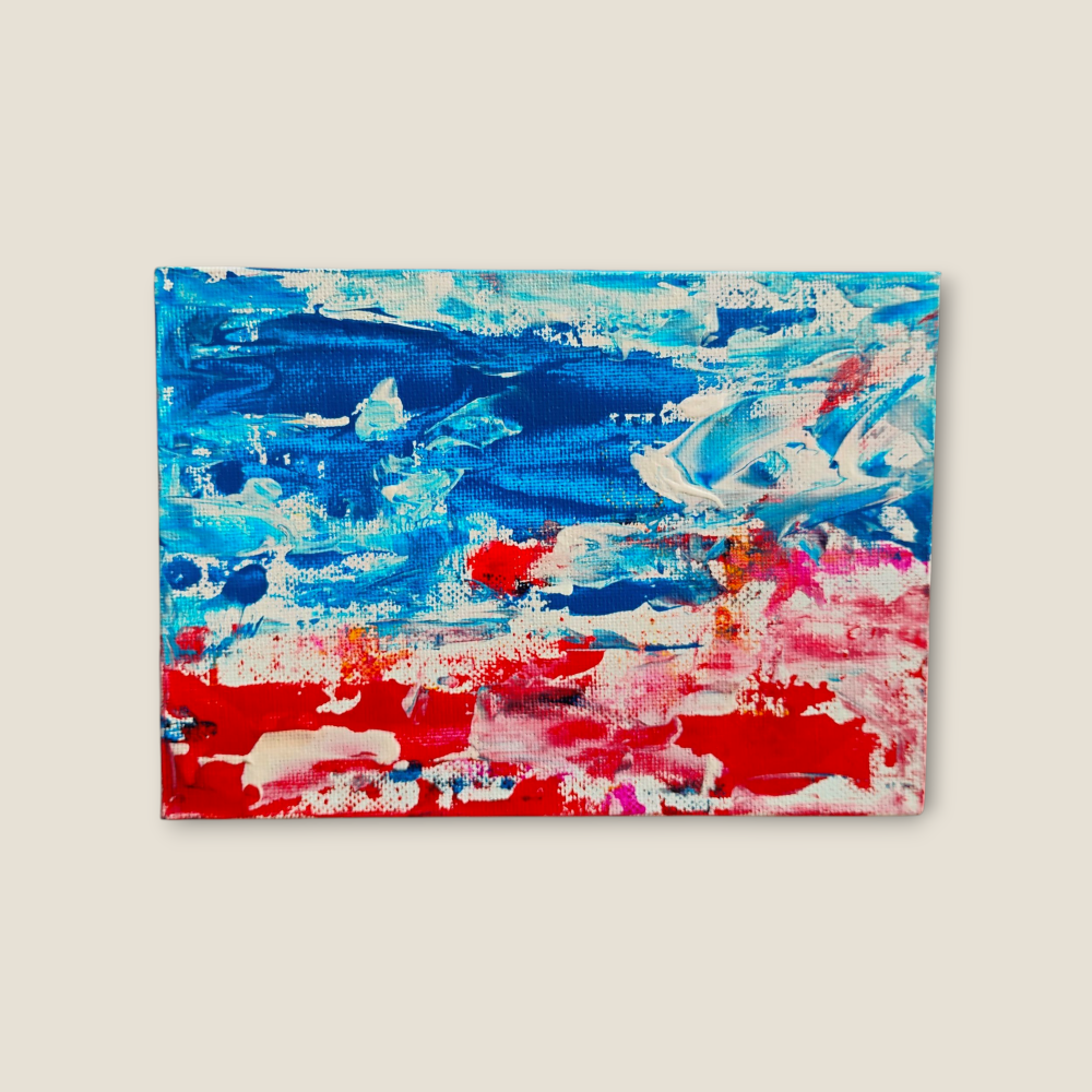 Medium: Acrylic on canvas board
Size: 13 × 18 cm / 5 × 7 in
Year: 2025
Description: A dynamic abstraction where red, blue, and white collide in spontaneous movement. The composition vibrates with contrast and rhythm, capturing the raw energy of emotion as it transforms into light and motion on the surface.