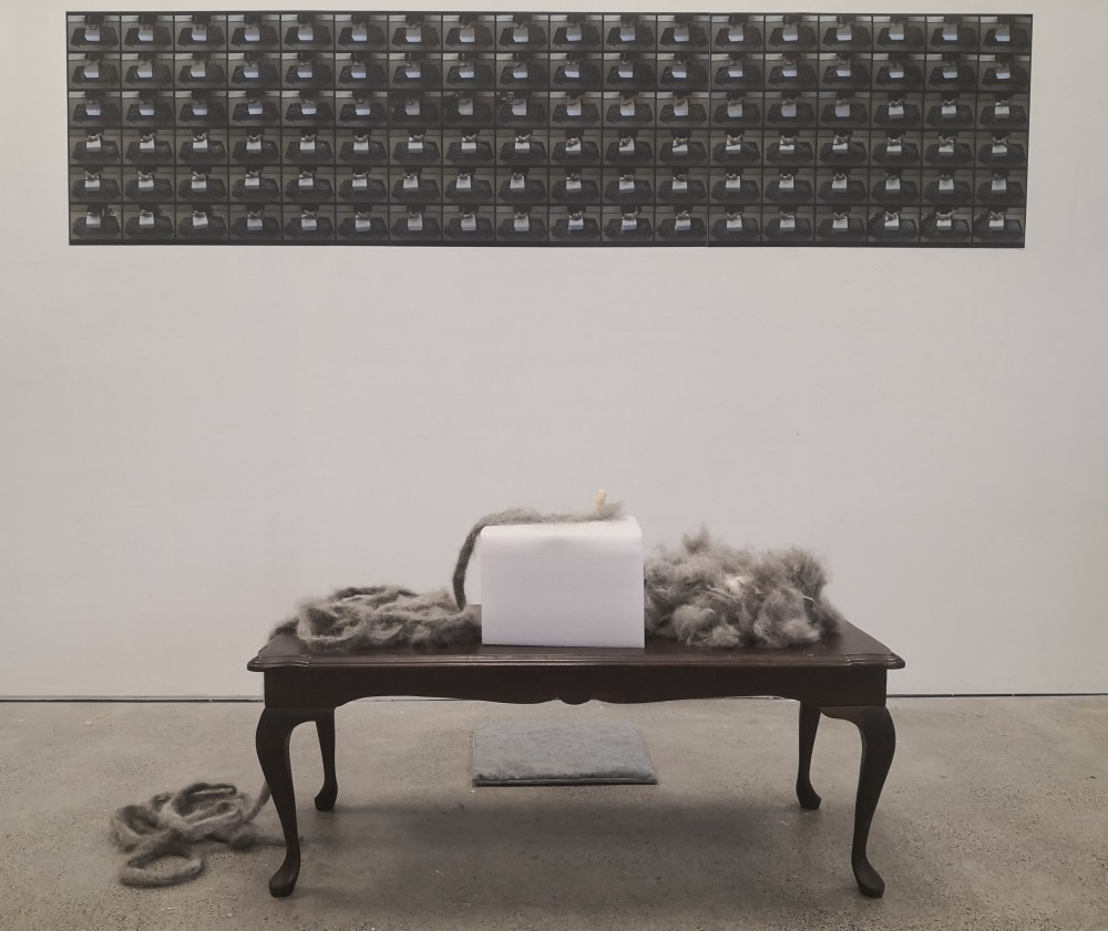 November 2020
Husky Fur, Wooden Table, Foam Board, Felting Needle, Digital Photos Printed

Does a painting have to be painted? Finding inspiration in the things around me, I employed needle felting and dog fur to express an idea of time, identity, and emotional memory. Central to this work is its innovation and substitution, breaking boundaries of painting, moving image, and performance while combining all these elements. Using still images to document myself felting the fur of my dog “Neko”.