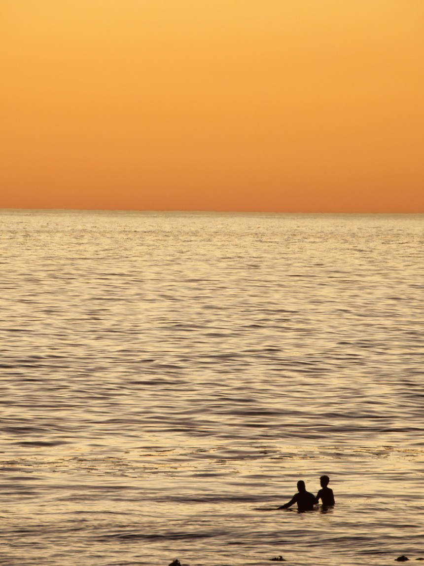 Father and Son Sunset Surf