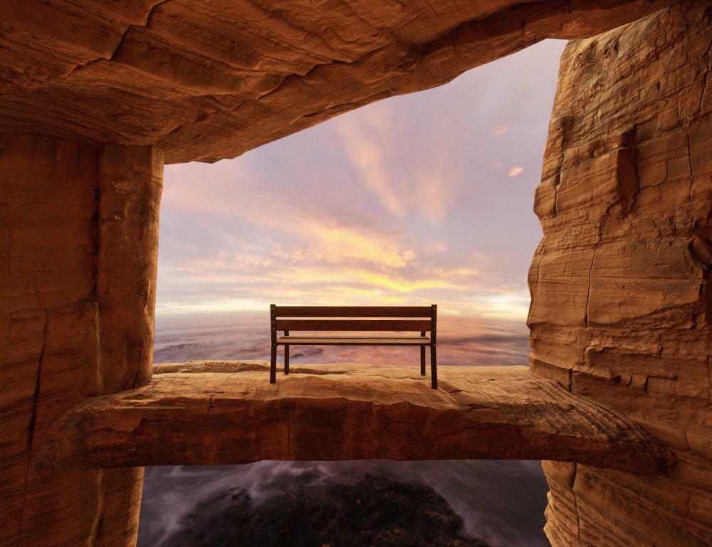 Horizons Unseen reflects the idea of horizons that have yet to be discovered, the invisible and the unknown that the future holds for us. The piece presents an empty bench, suspended on the edge of a cliff between two rock formations, and is intended as an invitation to introspection, to pause and contemplate what we cannot yet see.
The void beneath the bench symbolizes the uncertainty we feel in the face of what has yet to happen, while the rocks represent the stability and foundations upon which we rely in life. The horizon bathed in warm light suggests hope, a promise of new opportunities yet to be revealed.
I wanted the viewer to project themselves into this space, to feel that the bench is there for them, inviting them to take a moment and face their own "unseen horizon" from a place of reflection and openness towards the future.