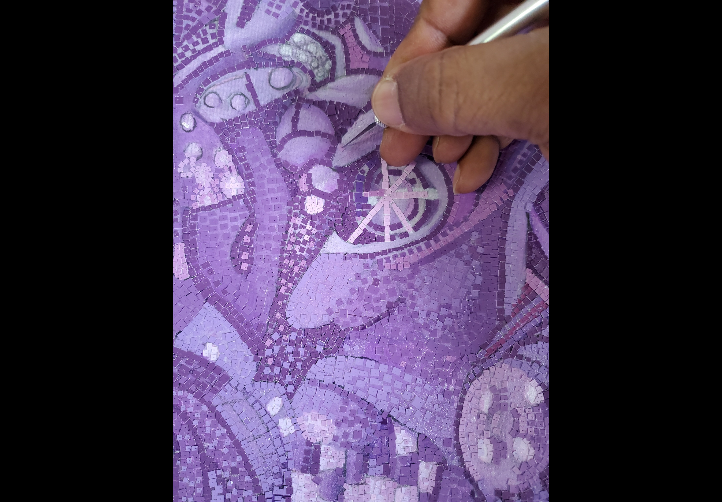 Lennox Commissiong is a New York–based artist specializing in paper pointillism, a technique using thousands of hand-cut paper fragments to create highly detailed portraits. His work explores identity and representation through a process that merges precision, texture, and time-intensive craftsmanship. His work has been exhibited at Gracie Mansion and New York City Hall and is held in notable private collections.