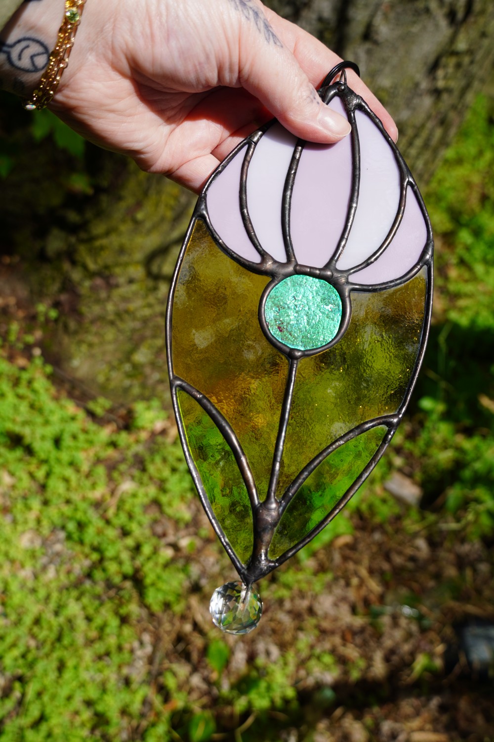 The second colorway, this piece features dichroic glass in the center. 

Created June 2025