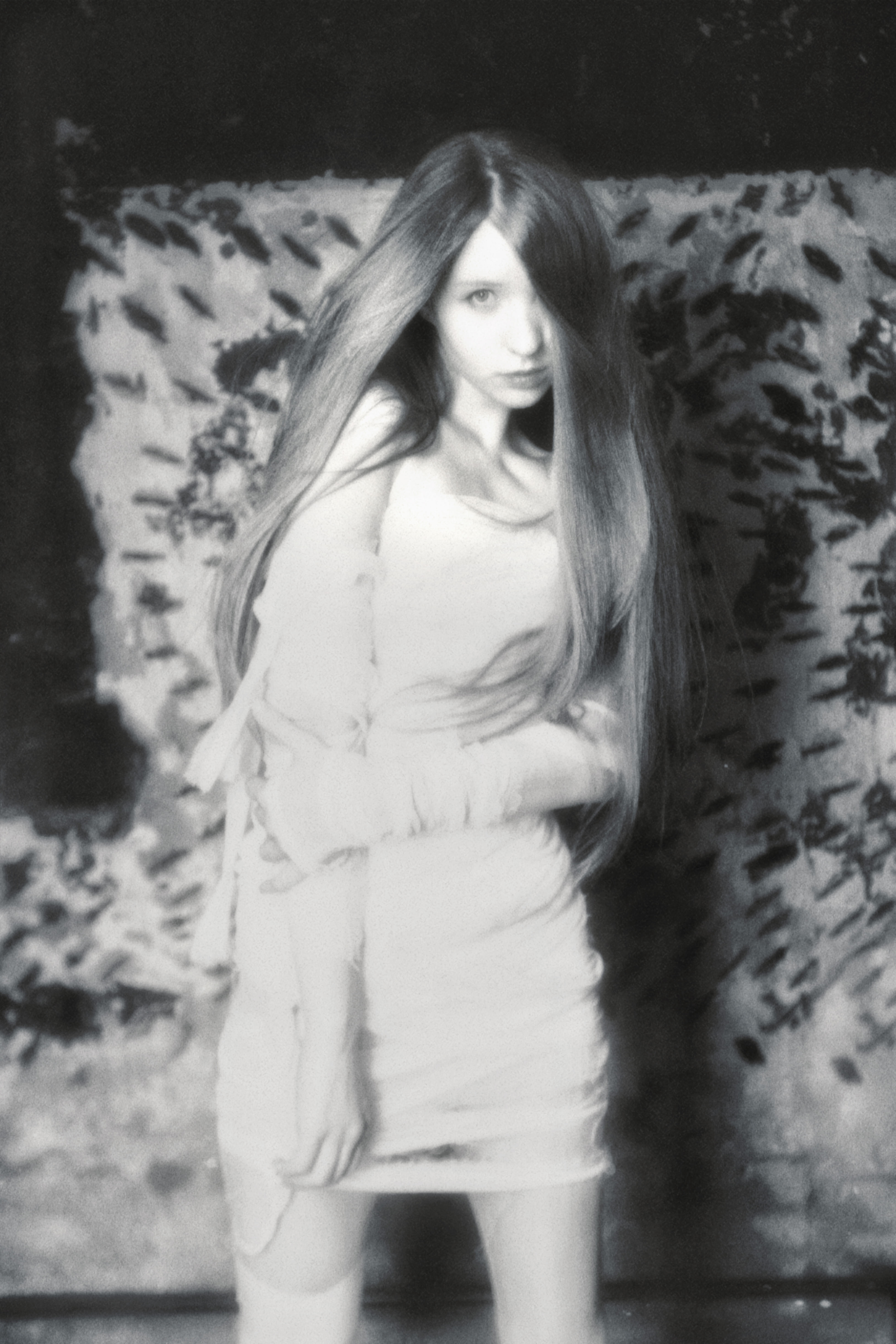 Nika Lynas (Veronika Pankova) is a digital introspective artist and author whose practice operates at the intersection of ephemeral surrealism and psychoanalytic research. 

Her work focuses on exploring the phenomenon of "digital codependency" and analyzing how a consciousness exhausted by the chaos of human relationships chooses the secure confinement of an algorithm over physical reality.

Nika’s visual language is built upon the anonymity of her subjects and a personal system of meta-symbols. She utilizes light and diffusion as her primary medium to convey borderline emotional states. Her work traces the logic of a transition from physical fragility to the state of an "exhibit": the creation of a digital ideal that is devoid of tactility but protected by code.

In 2024, her series "The Face of Introspection" became an exploration of female subjectivity and the mechanisms of healing following prolonged emotional abuse. This experience also formed the basis of her book "CRYolite" — an autobiographical thriller about self-isolation as a form of creative freedom.

Today, through her art, Nika demonstrates that in a world of unrealistic standards, the projection of an ideal becomes the only safe haven. Her practice is a meta-symbolic conceptualization of pain, where the digital medium serves as a tool to capture and structure layers of the psyche that cannot be expressed in words. She lives and works between inner space and digital worlds, transforming personal vulnerability into a resilient myth.

Her works have been exhibited in New York, Mumbai, Montreal, Larnaca, Limassol, and Moscow, and have been featured in international contemporary art publications. They serve as phygital evidence of human fragility, existing on the edge between physical reality and the infinite expanse of digital worlds.