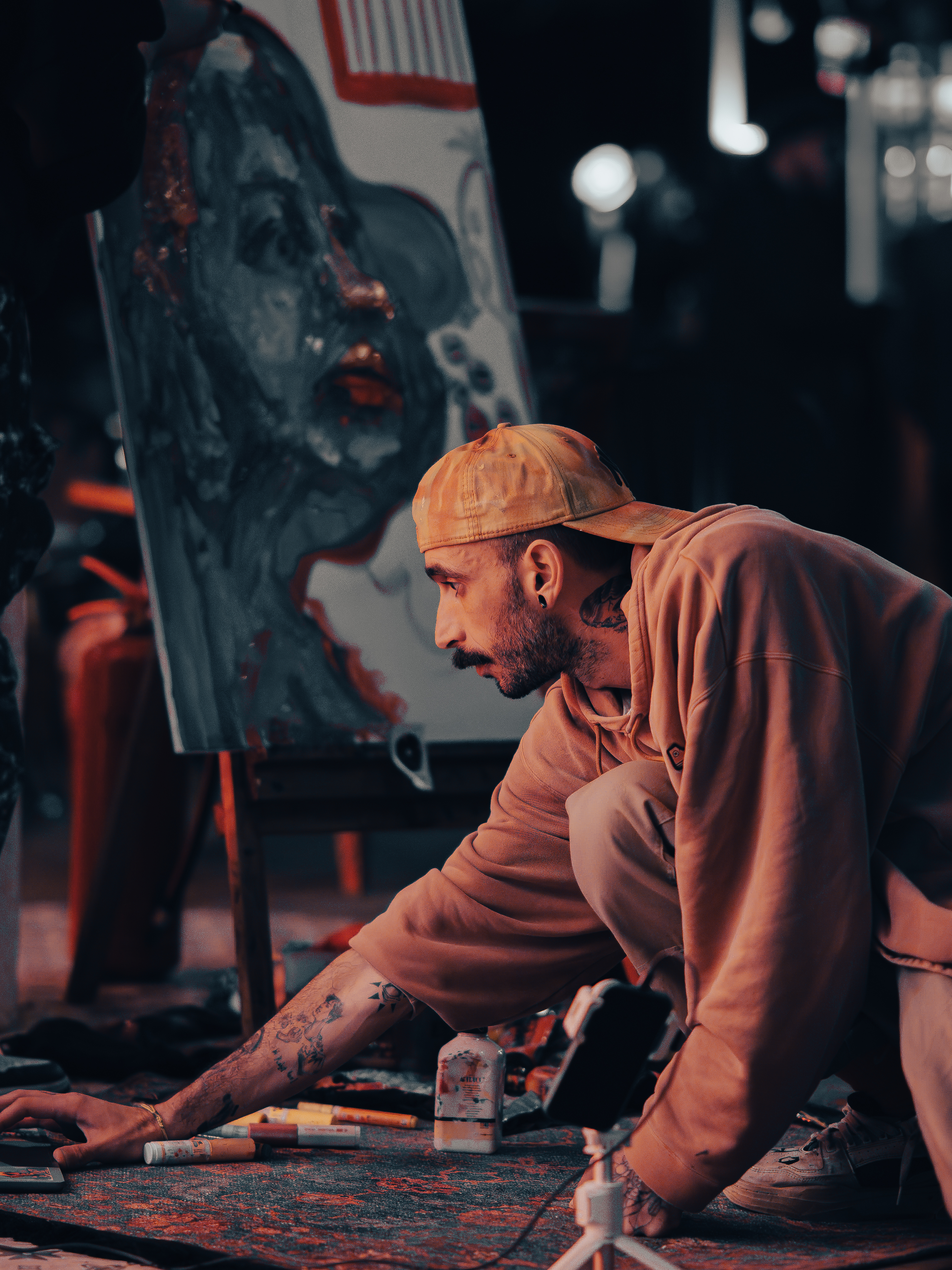 Ogün Kızmaz is a multidisciplinary artist whose practice combines traditional painting, murals, tattoo art, digital production (2D–3D), live performance, and blockchain technology into a hybrid artistic process. He continues to learn and aims to build a name that will endure in history.

Drawing from an impressionistic approach, his works follow the traces of daily experiences and fleeting emotions. Through lines, color, and gestures, he explores the idea of “capturing the moment” across both traditional surfaces and digital environments.

His work in the Web3 space has evolved through NFT collections, live painting performances, generative works, and community-driven projects. By bringing his practice onto the blockchain, he seeks to make both the evolving stories of artworks and the process of creation itself visible over time.

For Ogün Kızmaz, art is not merely a result but a process, an encounter, and a collective experience. His live painting performances, often accompanied by live music, emerge as a product of the local community ÖTEKİ.LER (it means OTHERS), of which he is the founder and builder. As the creator of the ÖTEKİ.LER community, he aims to leave a mark together in a world increasingly poisoned by excessive individualism. With the motto “From Idea to Benefit”, the collective produces creative work and content that serves both individuals and brands, ranging from digital content to social media visuals and other creative outputs.

Through sketch-based productions and digital collections, he invites the audience to become part of the moment of creation, while his live painting performances build an interactive and open creative process. Collaborating with many DJs and local musicians, he aims to expand the space where visual artists can exist within the entertainment and performance scene. His invitation is simple: “Come, let’s have fun together.”