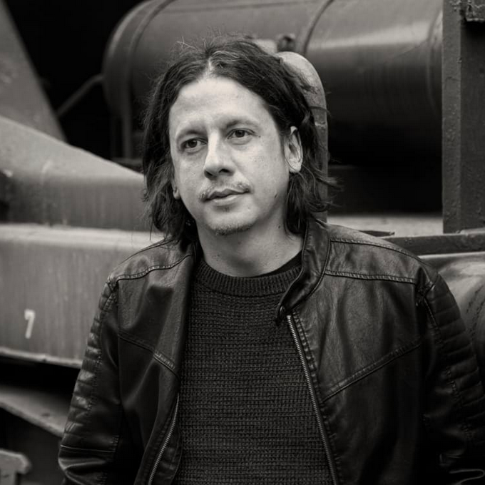 Koprivnjak’s work is deeply conceptual and often explores metaphysical themes. He speaks of an “obsession to break through the veil” between reality and imagination. His art frequently addresses human connectivity, consciousness, and spiritual transformation. A recurring feature is the blending of organic life and digital form – for example integrating genetic strands, seeds or breath into electronic compositions. Visually, he works with cutting-edge digital tools (Blender 3D, ZBrush, After Effects and AI generative systems) alongside traditional media like sound and cinematography.

Koprivnjak international reach is extensive. Exhibited globally in cities including New York, Miami (Art Basel), Tokyo, Hong Kong, Basel, London, Paris, Dubai, Monte Carlo, Lisbon, Romania, Amsterdam and Australia. He is a member of Animus Society and has collaborated with Beeple, in his studio, on the election night 2024. 

The interplay of chaos and order, or organic vs. synthetic, is a consistent motif in his style. Koprivnjak also cites music and sound (notably his early experience with the electric guitar and studio production) as influences on his multimedia approach. Critics note Koprivnjak as a boundary-pushing artist integrating science, spirituality and digital media. He has become a visible figure in both the emerging “space art” niche and the international digital/NFT community, garnering praise for innovation and a wide exhibition footprint. Overall, Koprivnjak represents a pioneer in pushing digital art beyond Earth, merging technology with profound philosophical themes.