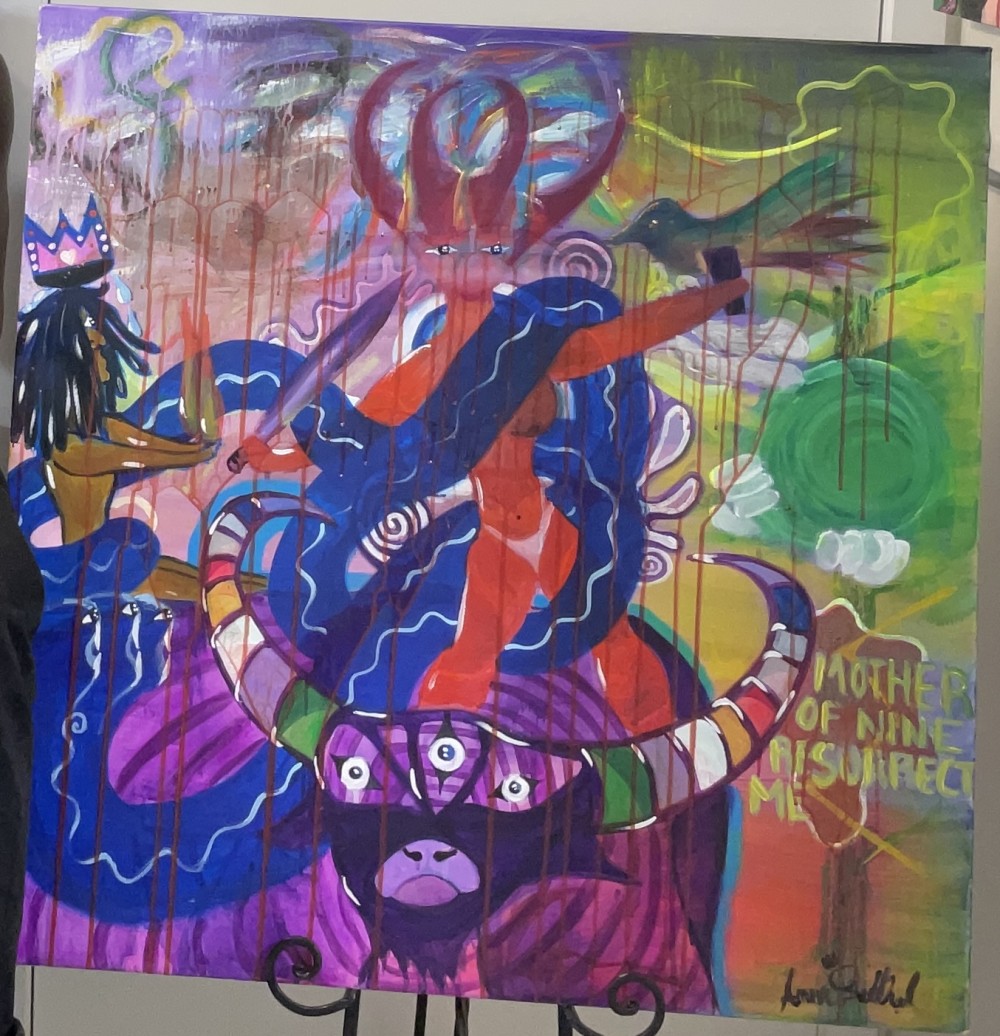 The alchemical process of death and transformation through the Goddess Oya mother of nine through a process of automation. The fire and the snake represents the active kundalini energy partaking the process of death and transformation itself.